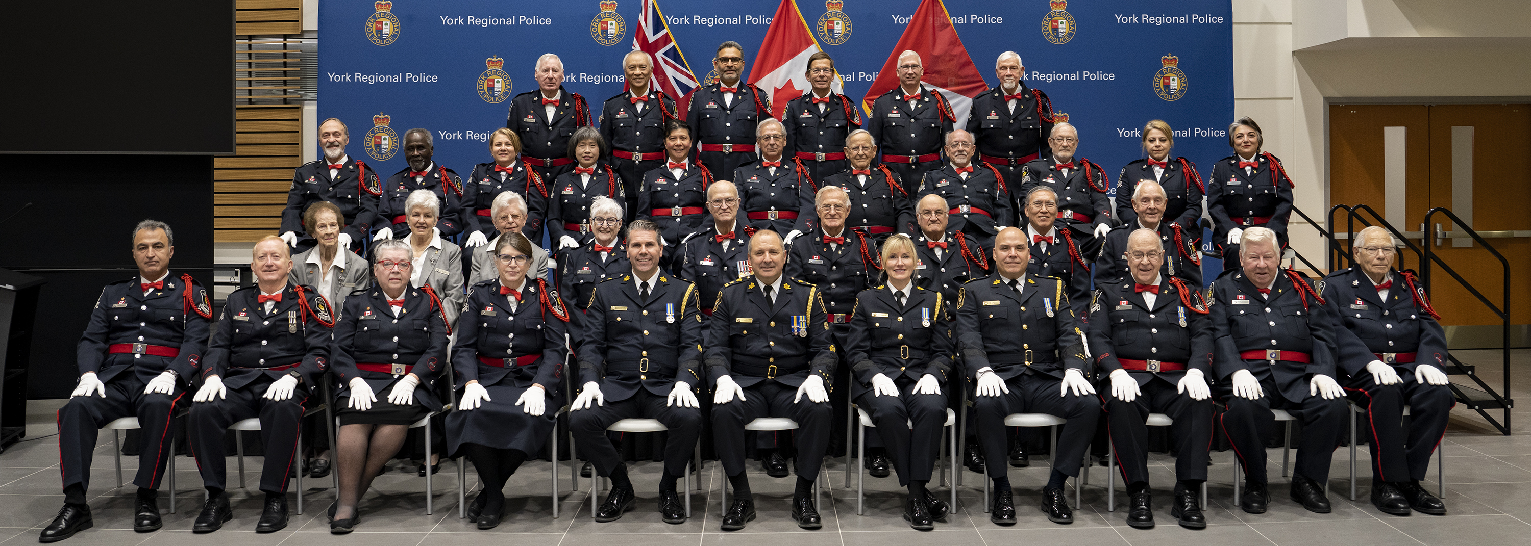 Men and women in uniform posing for a picture