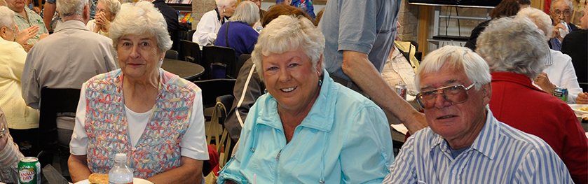 Three smiling seniors