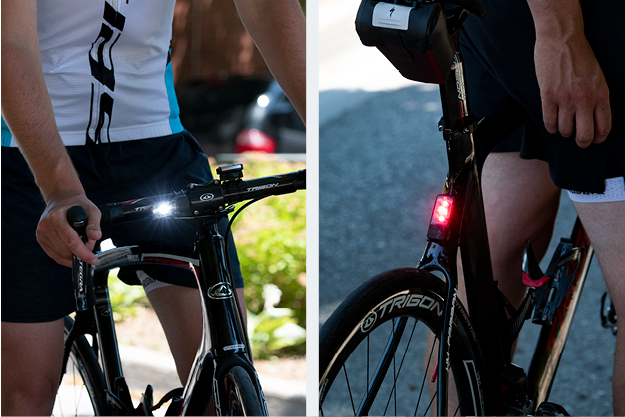 A bicycle equipped with a shining white light attached to the handlebar