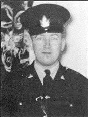 A black and white photo of a police officer