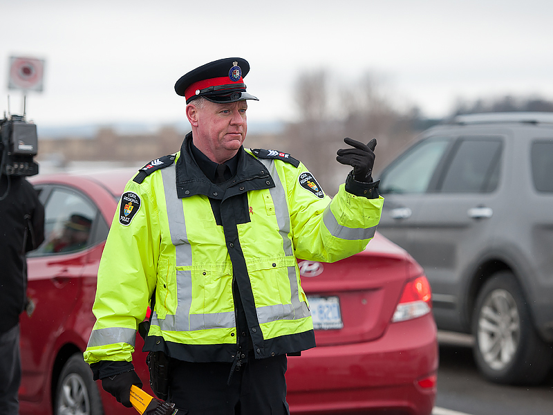An officer directs traffic