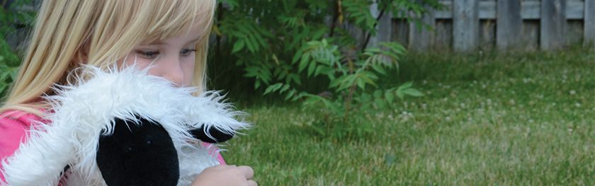 Small girl with stuffed animal