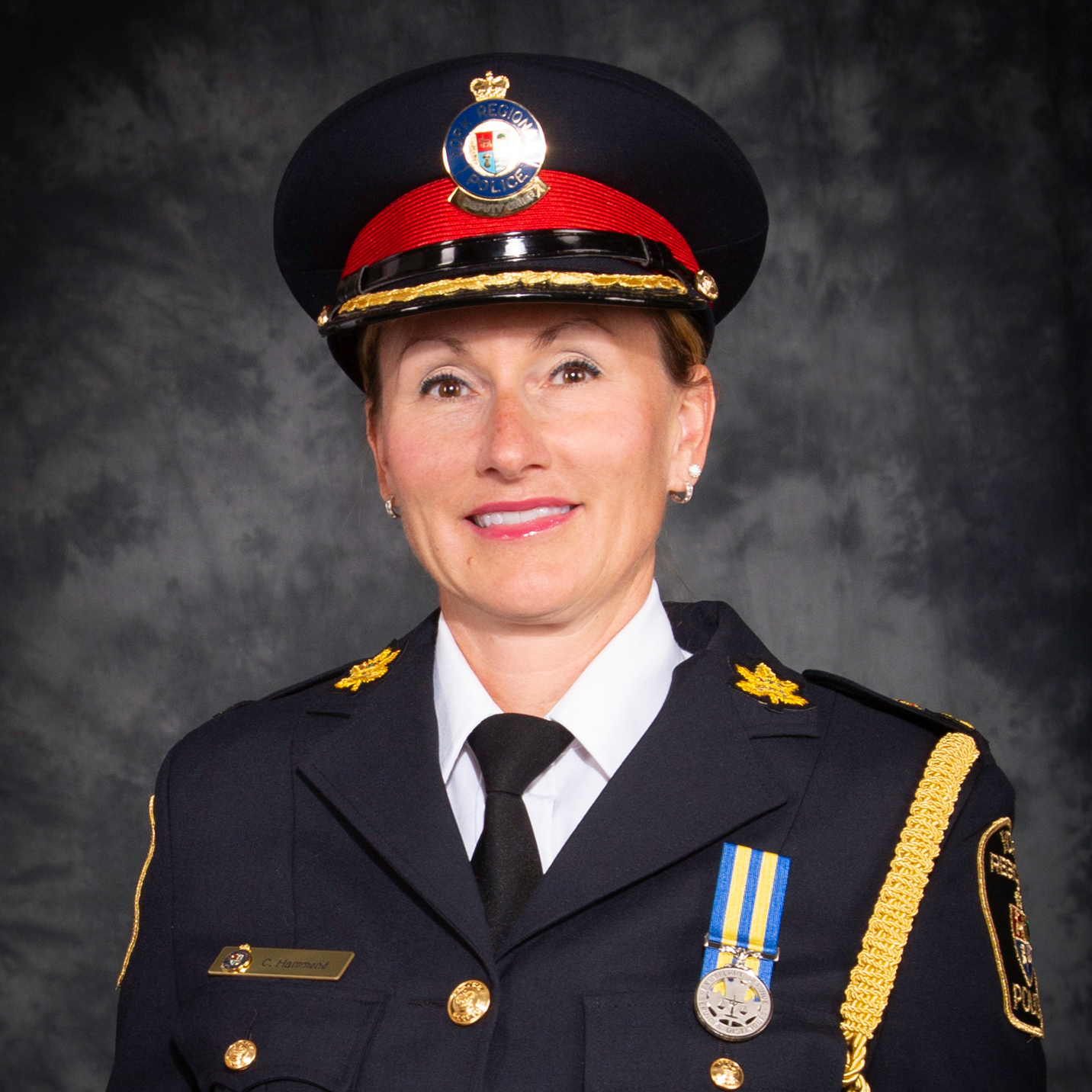 A woman in a police uniform