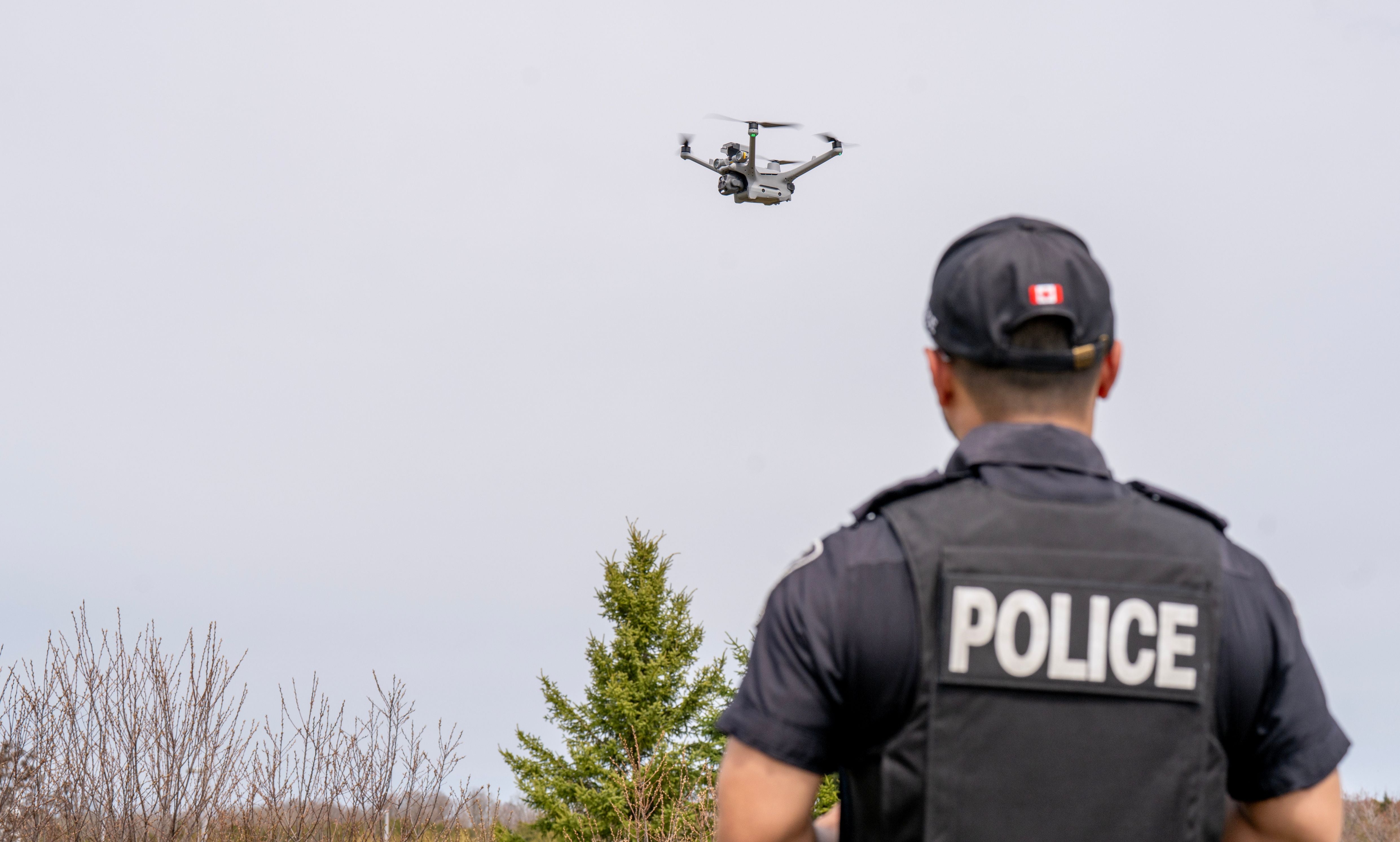 Officer flying drone
