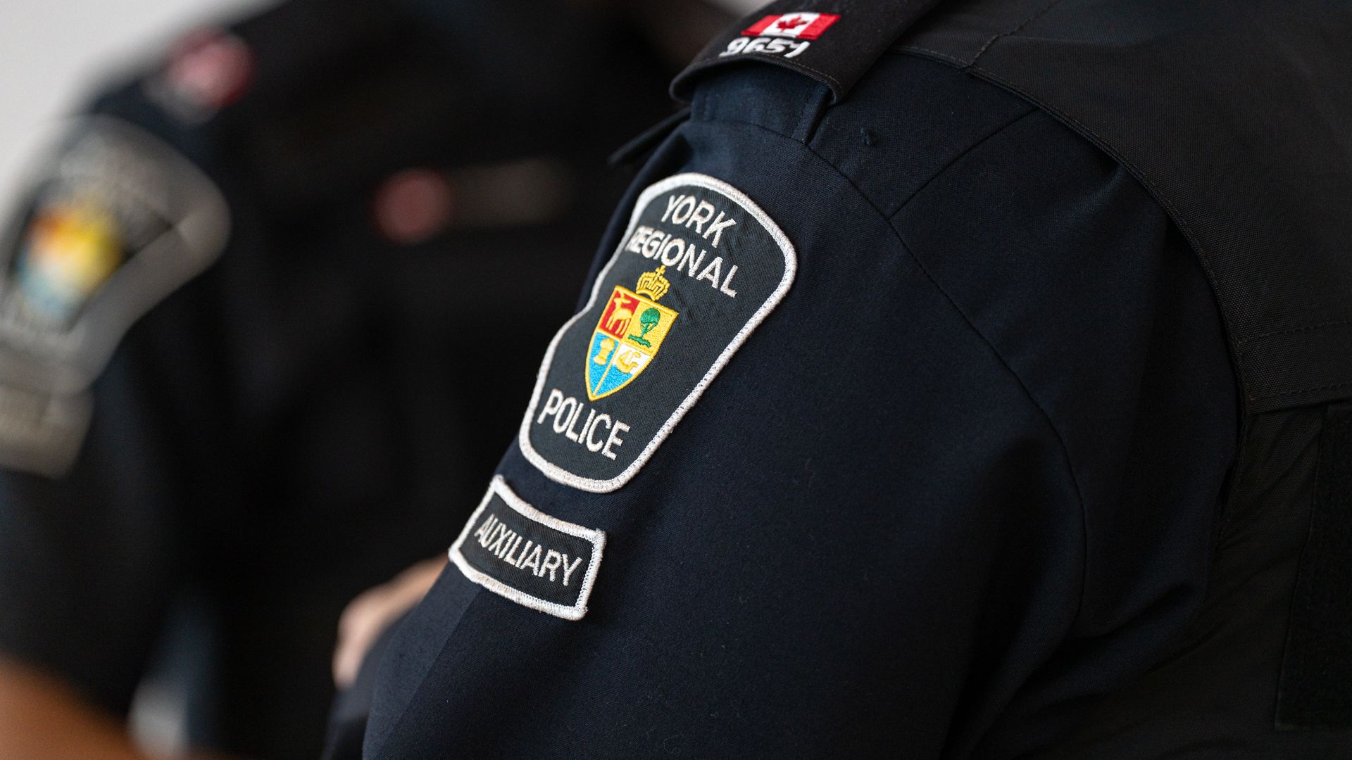 An auxiliary shoulder patch