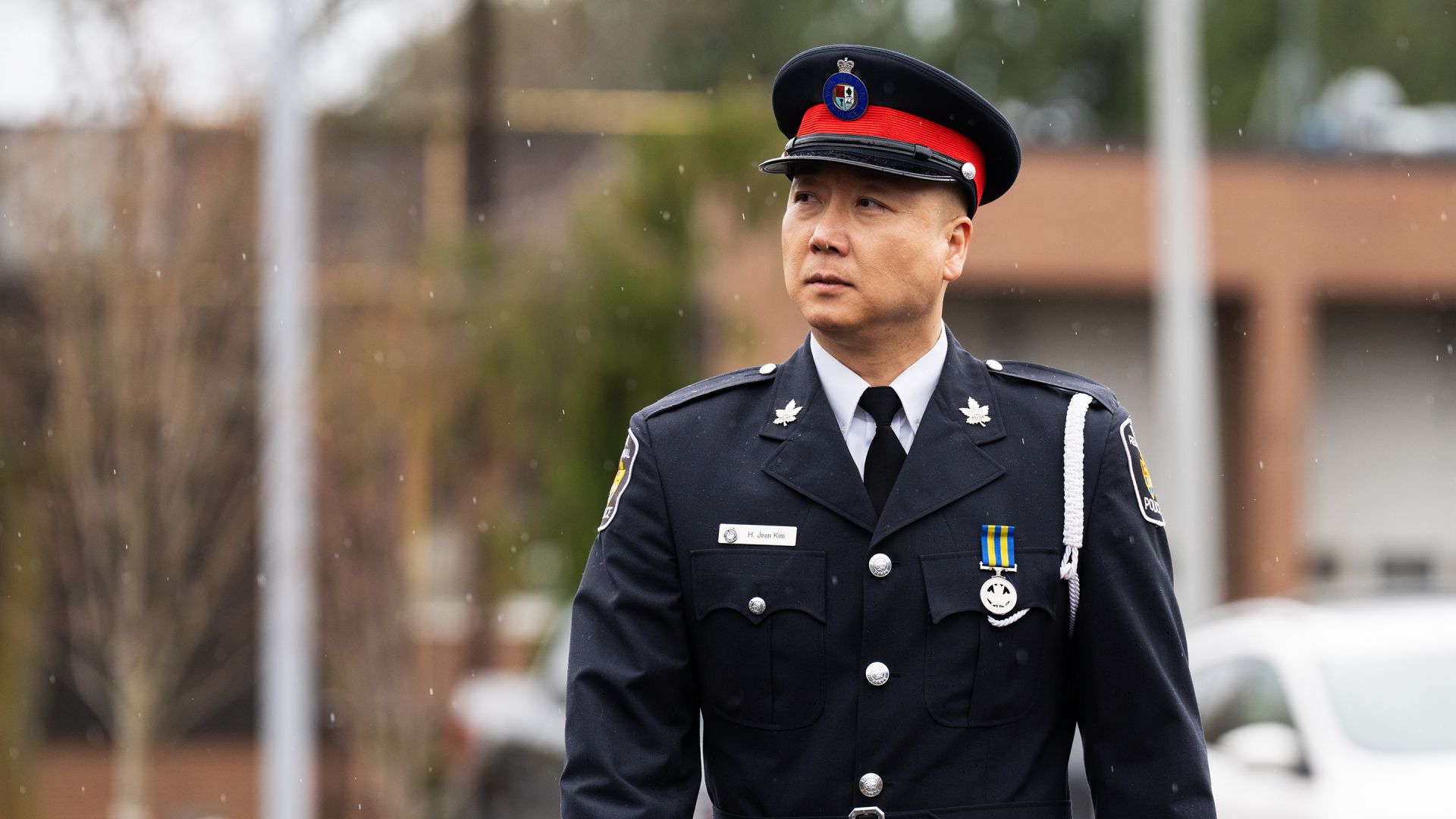 A man in a formal police uniform