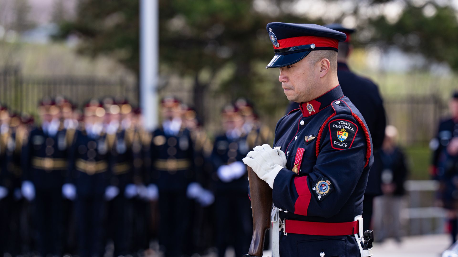 Man in officer with head down.