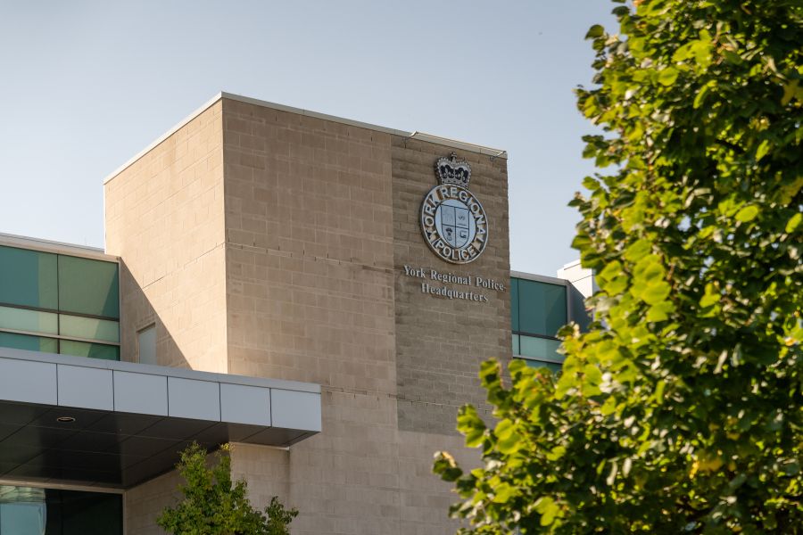 York Regional Police headquarters with the logo mounted on the building's facade.