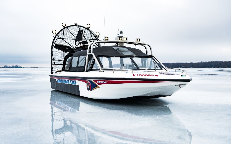 Close up of York Regional Police airboat on an iced over lake.