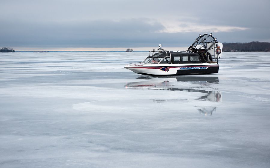 York Regional Police airboat on an iced over lake.