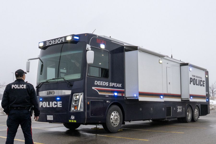 A large truck reads POLICE