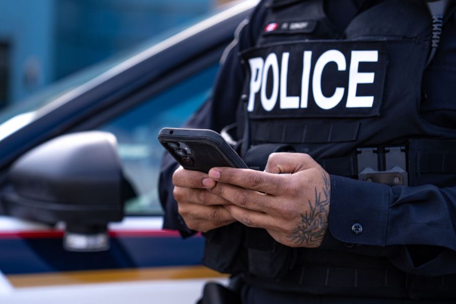An officer with a cellphone