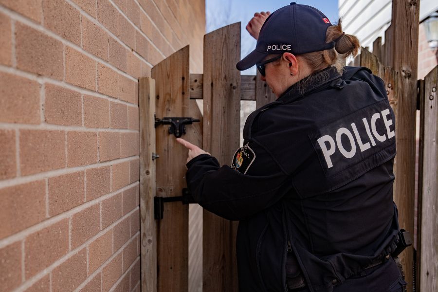officer securing a gate