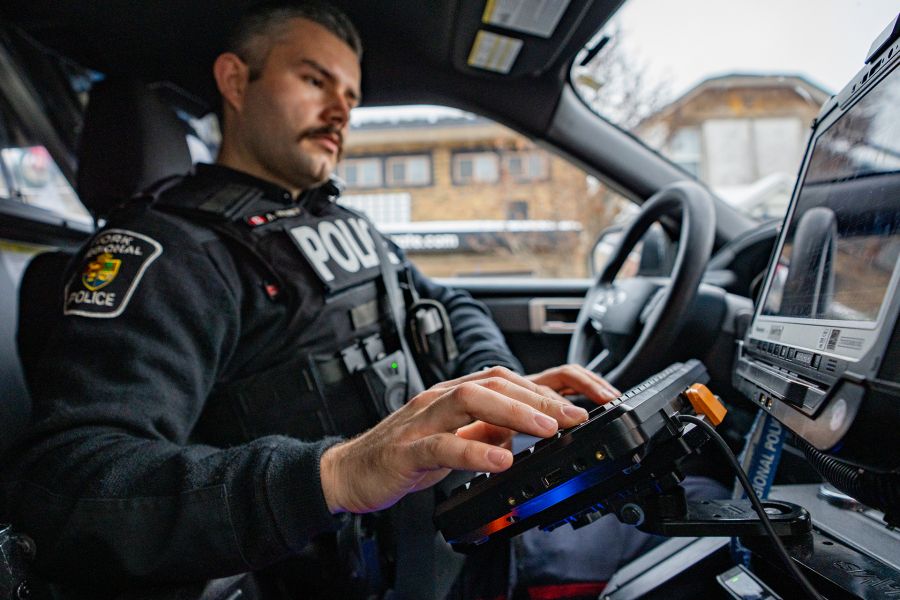 officer in cruiser