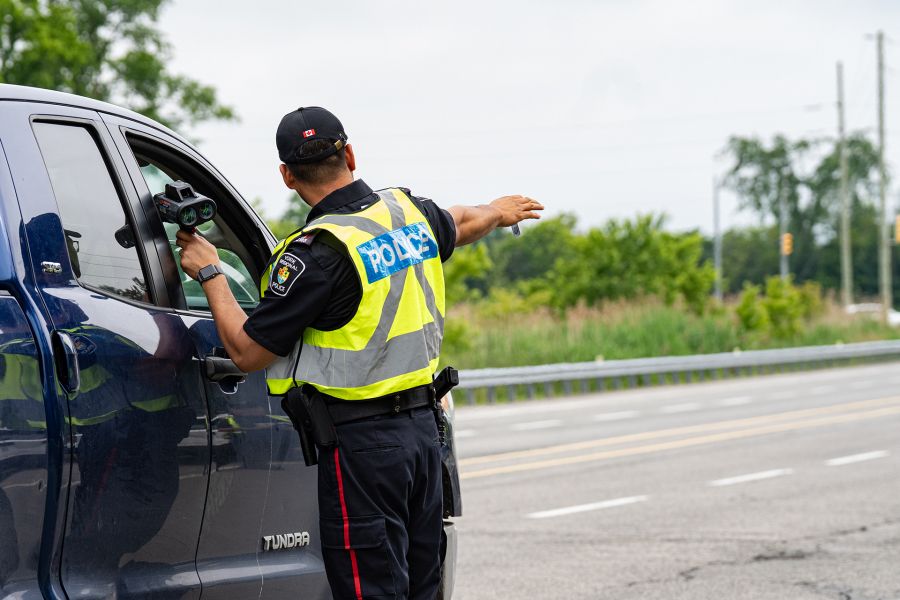 officer talking to driver