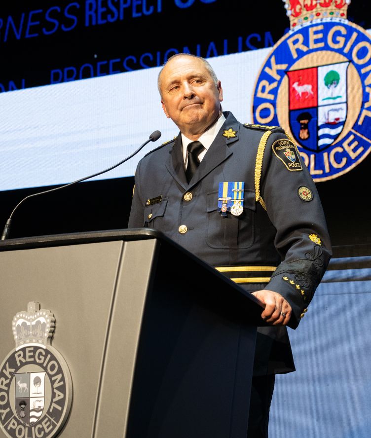 YRP Chief Jim MacSween stands at a podium