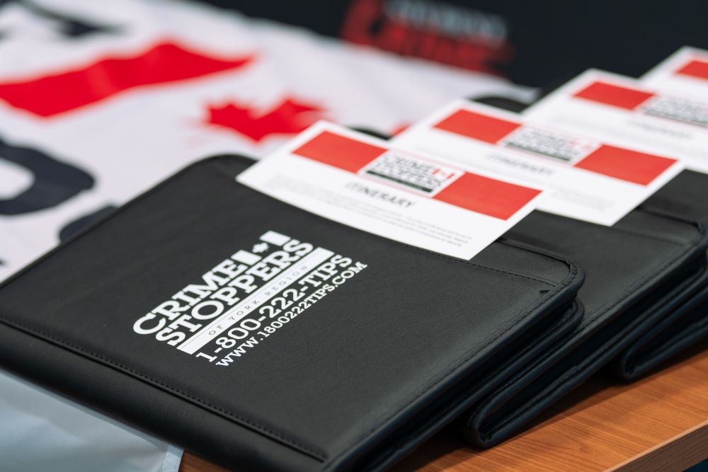 A close up image of Crime Stoppers folders